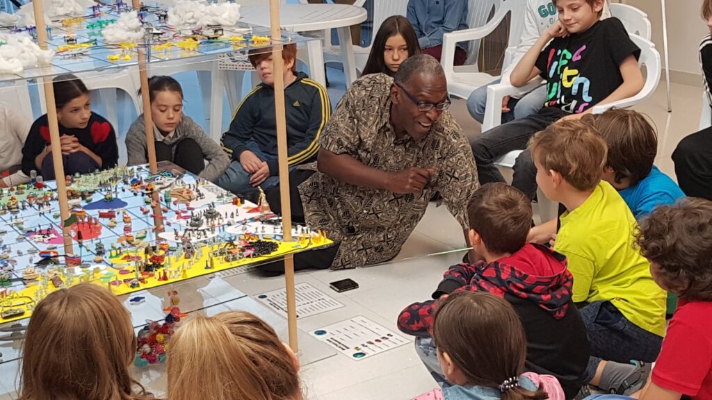 Playing a Game, Building a Better World  