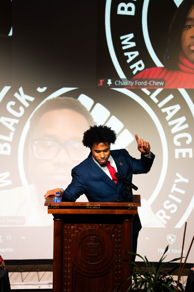 BSA President Jonathan Delgado reads from the lecturn