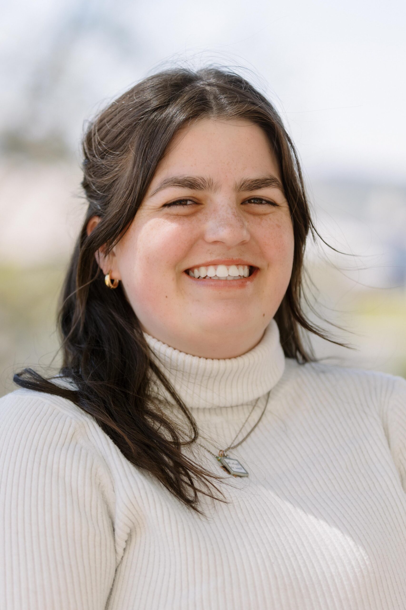 Professional headshot of Elle Lewis-Eme