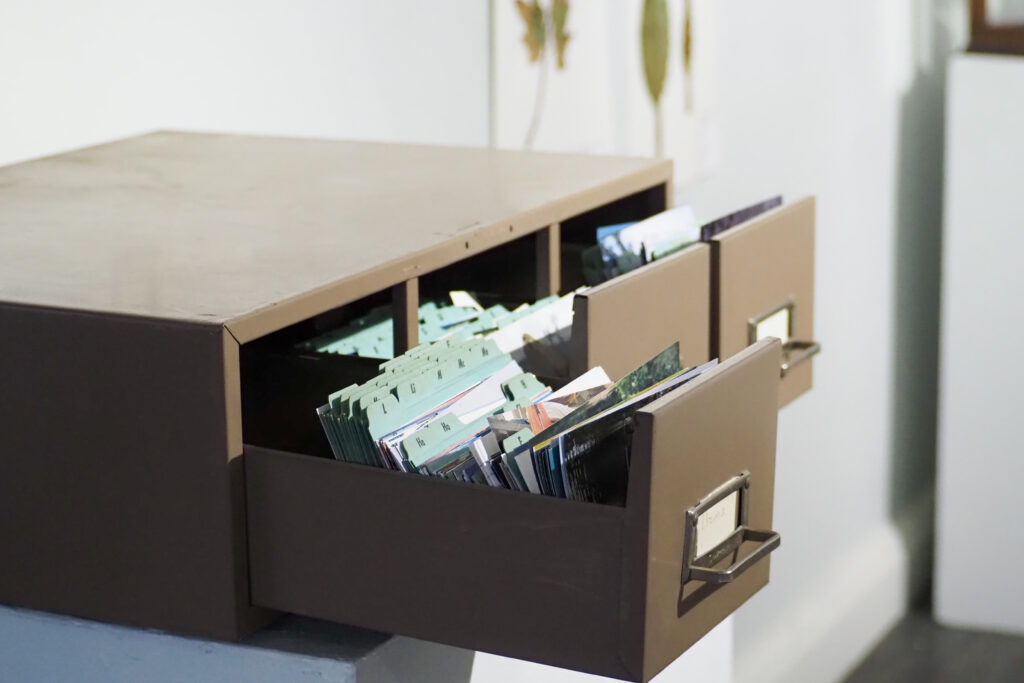 Filing drawer pulled out to reveal organized papers