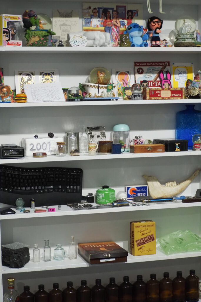 A cabinet full of cards, photos, and other sentiments from the MBU community